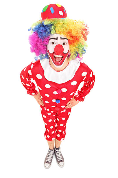 istock Funny male clown looking at camera 487833565