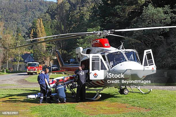 Air Ambulance Helicopter Evacuates Rural Accident Victim To Hospital Stock Photo - Download Image Now