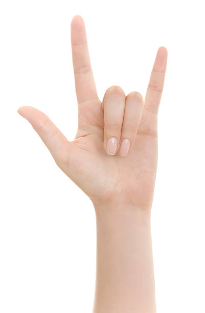 Hand sign - Clipping path Hand sign isolated on white with clipping path. horn sign stock pictures, royalty-free photos & images