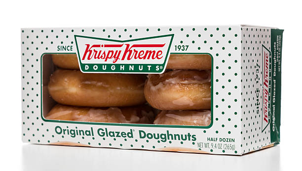 Vidrio rosquillas Krispy Kreme original de media docena de huevos - foto de stock