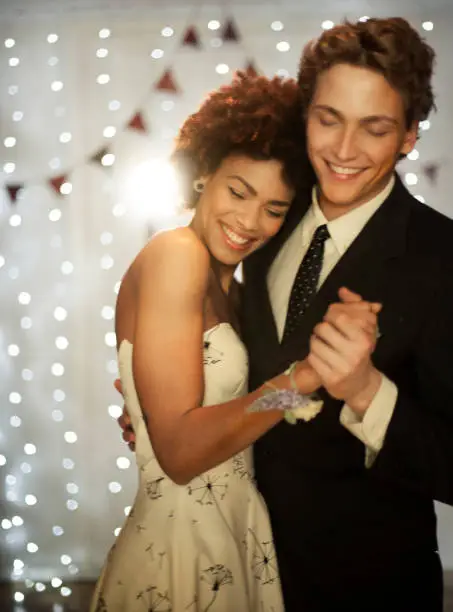 Couple dancing at prom party