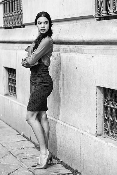 istock Hispanic stewardess in urban background 487834658