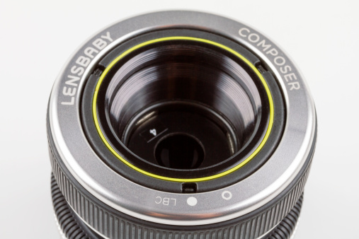 Mexico City, Mexico - April 26, 2014: Close up of a Lensbaby Composer lens, isolated o white background. Lensbaby are SLR lenses for special-effect photography
