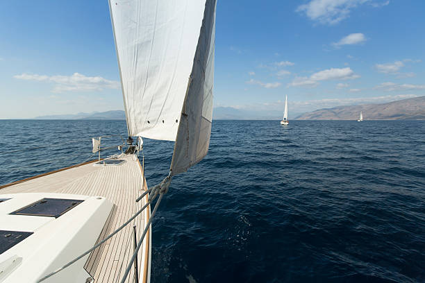 istock Yachting. Sailing in the wind through the waves. Luxury yachts. 487836678