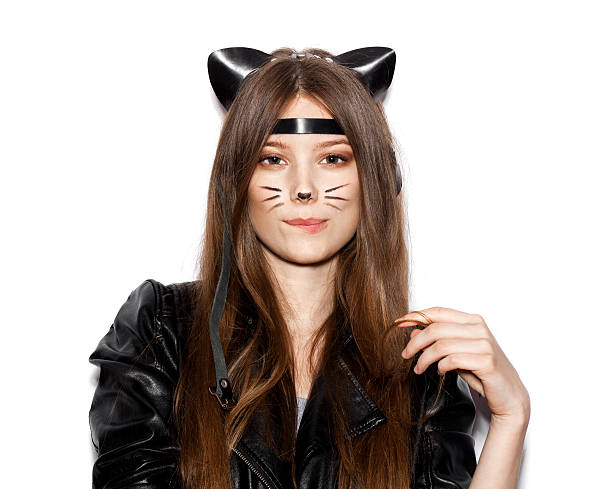 istock Funny girl represents as small cat having fun 487839498