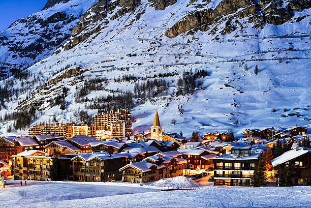 Val d'Isère city Famous and luxury place of Val d'Isere at sunset, Tarentaise, Alps, France savoie photos stock pictures, royalty-free photos & images