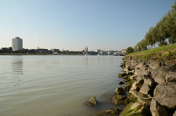 Linz, Austria - September 10, 2015: Danube and Cityscape of Linz in Upper Austria on a warm summer morning in 2015. 