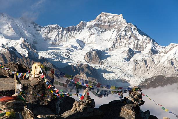 istock mount Gyachung Kang with prayer flags 487845950