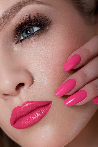 istock Manicure and Makeup. Beautiful Woman With Pink Nails 487852729