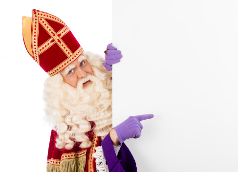Sinterklaas with placard. isolated on white background. Dutch character of Santa Claus
