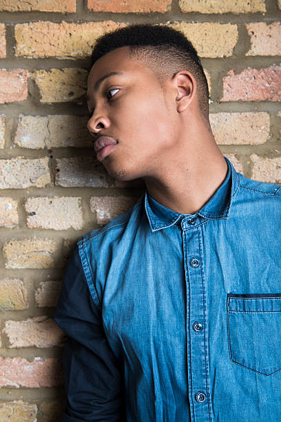 istock Young male fashion model 487853281