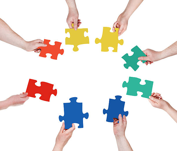 istock circle of people hands with puzzle pieces 487853757