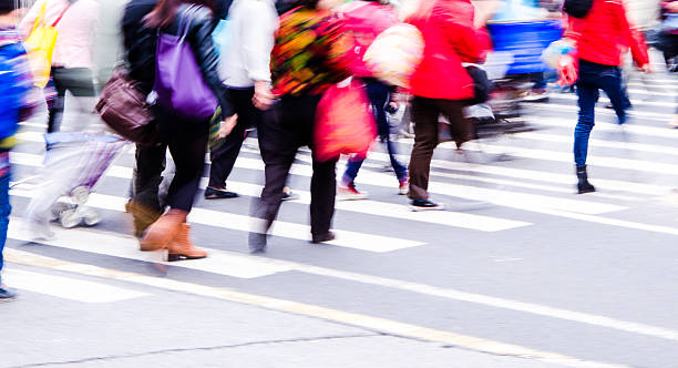 istock People walking on big city street 487854535