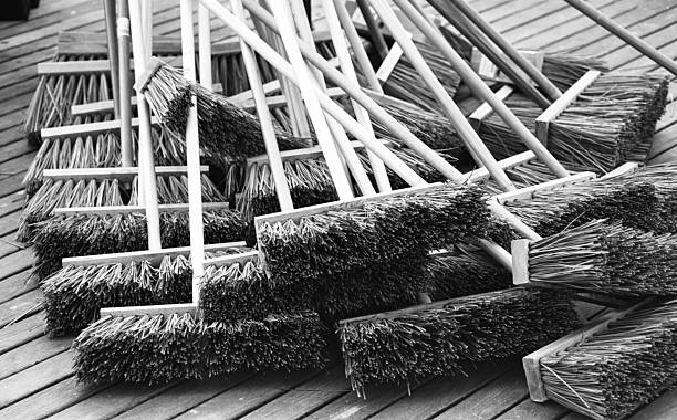 Cleaning-up after Hurricane Sandy The staging of brooms for the herculean effort to restore the Coney Island boardwalk after it was destroyed by Hurricane Sandy in 2012. broom photos stock pictures, royalty-free photos & images