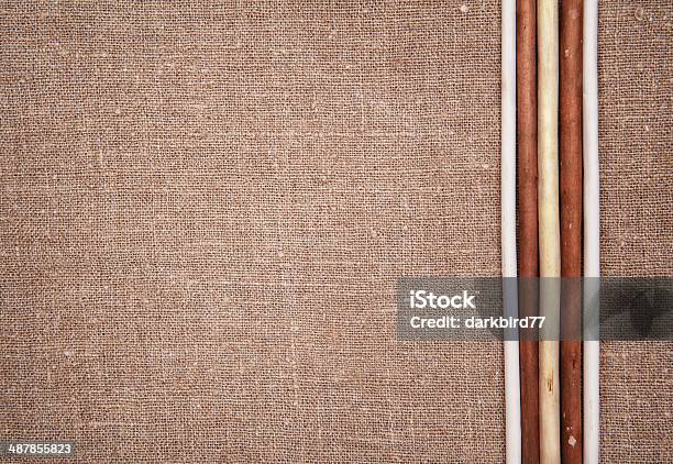 Burlap Linen With Wooden Sticks Stock Photo - Download Image Now - Blank, Border - Frame, Branch - Plant Part