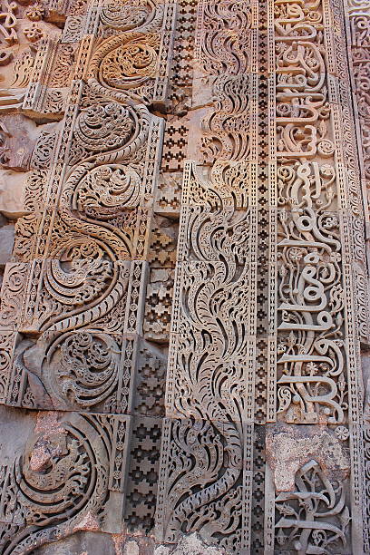istock Ancient inscriptions in Qutub Minar 487856089