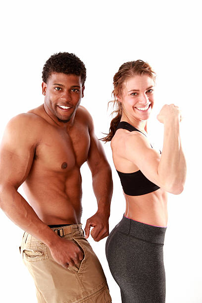 Beautiful young couple closeup portrait, two faces over white