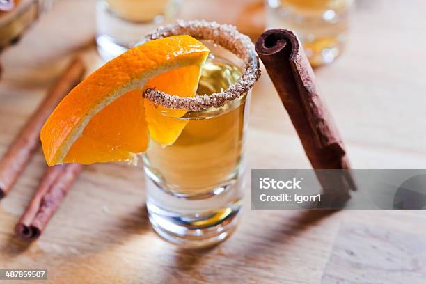 Tequila With Orange And Cinnamon Stock Photo - Download Image Now - Alcohol - Drink, Bar - Drink Establishment, Brown