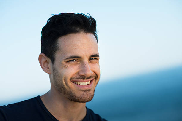 istock handsome young men on vacation by the sea 487860015