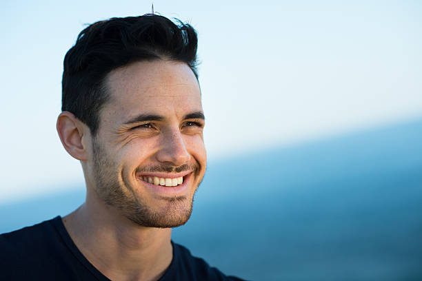 istock handsome young men on vacation by the sea 487860131