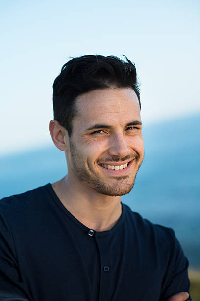 istock handsome young men on vacation by the sea 487877263