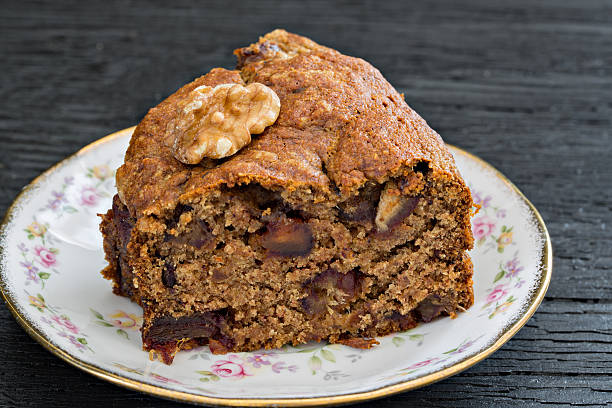 tranche de pain avec la date - walnut bread photos et images de collection