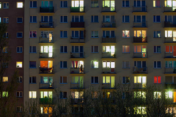 istock window of an apartment block at night 487879289