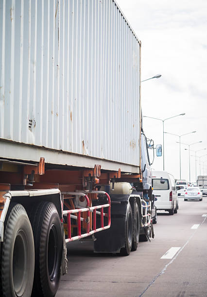 istock Truck with container on the road 487881015