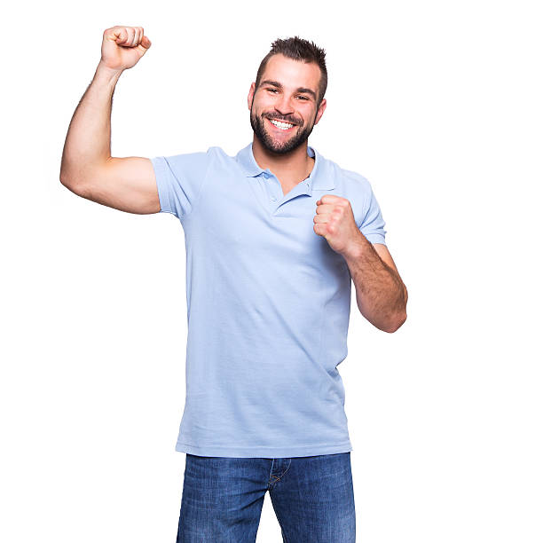 istock Young happy man in a blue polo shirt 487882745