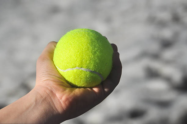 istock Tennis ball in his hand 487885119