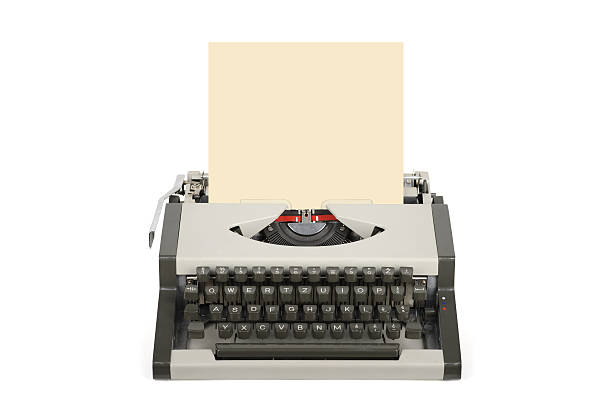 istock Travel typewriter with blank sheet isolated on white. 487898585