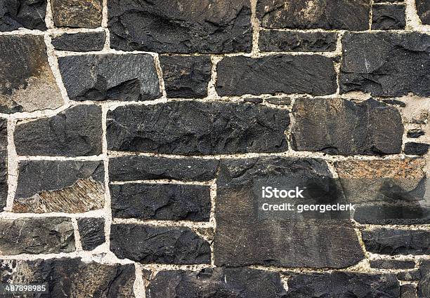 Dark Stone Wall Stockfoto und mehr Bilder von Abstrakt - Abstrakt, Alt, Altertümlich