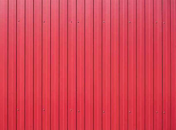 istock Red metal vertical fence as background 487899525