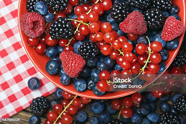 Fresh Berries On A Wooden Table Stock Photo - Download Image Now - Berry, Blackberry - Fruit, Blue