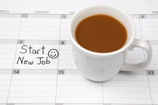 Recruitment or Employment Issues: Start New Job written on a calendar and a cup of coffee.
