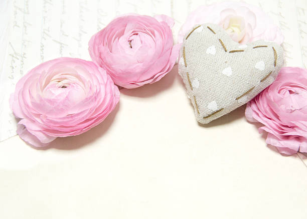 istock Ranunculus flowers and heart 487902085