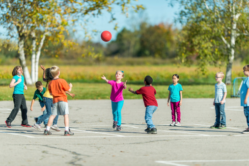 Kids playing outside during recess.