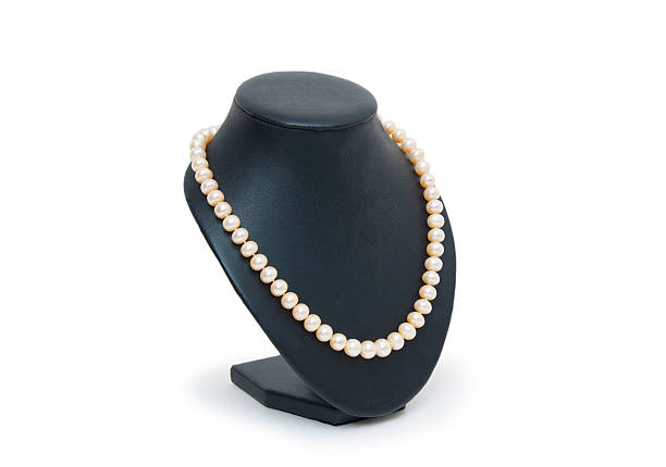 istock Pearl necklace on black mannequin isolated 487904249