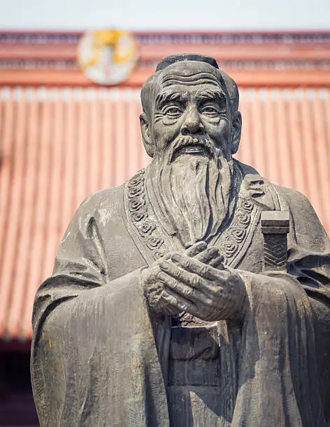 A stone statue of the Chinese philosopher and teacher Confucius, who lived between 551 and 479 BC. 