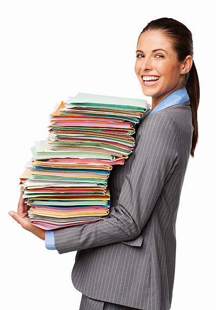 istock Businesswoman Carrying Stack Of Work Files - Isolated 487905471
