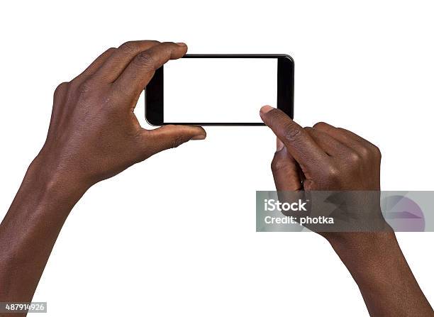 Hombre Tomando Una Foto Usando Un Teléfono Inteligente Foto de stock y más banco de imágenes de Sacar una foto