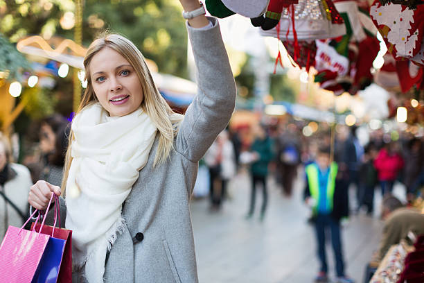 istock Female shopping at festive fair 487917554