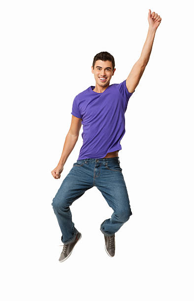 istock Young Man Jumping In Mid-air - Isolated 487919249