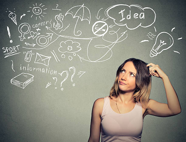 istock puzzled woman thinking scratching head has many ideas looking up 487919474