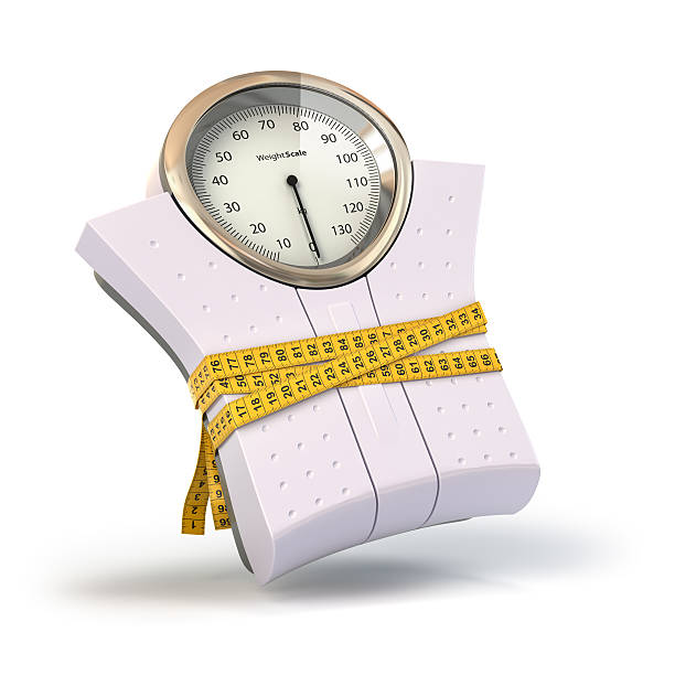 weighting scales with  measuring tape. diet concept. - 公斤 個照片及圖片檔