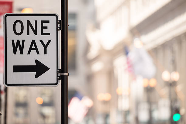 One Way One way sign with copy-space. one way stock pictures, royalty-free photos & images