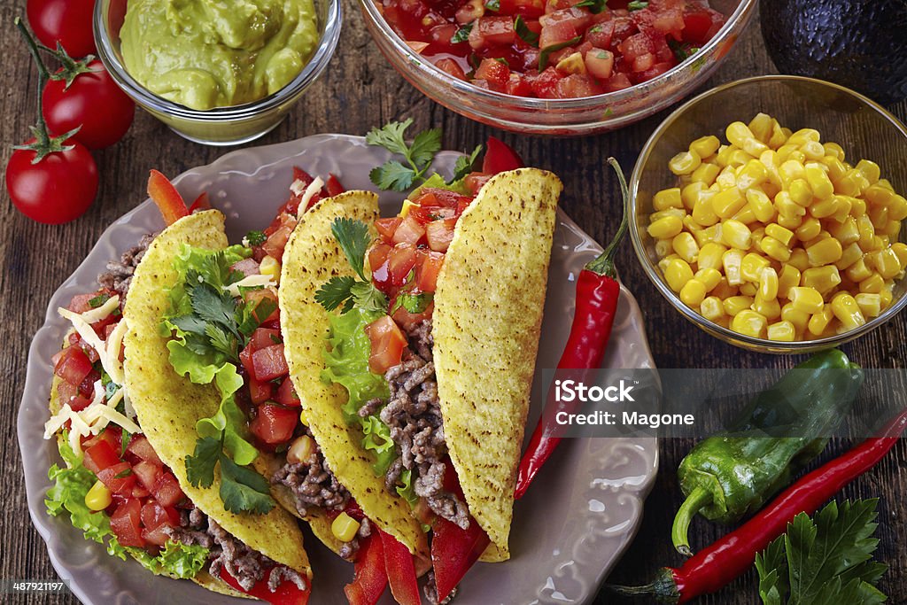 Mexican food Tacos Plate of Mexican food Tacos on old wooden table Mexican Food Stock Photo