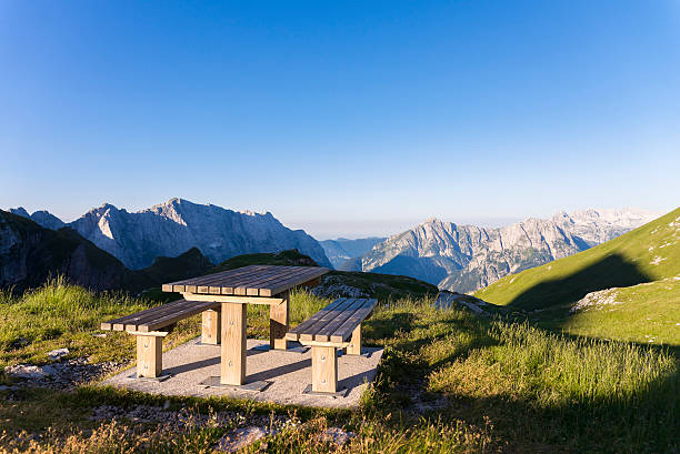 istock Lonely bench with beautiful view in mountains 487921272
