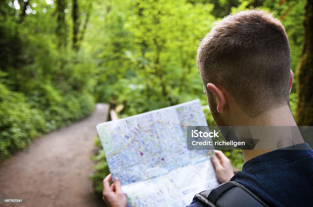 Map Reading Image Reading A Map Stock Photo - Download Image Now - Map, Hiking, Holding ...