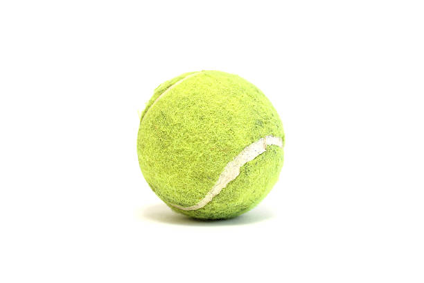istock Bright tennis ball on white background 487921460
